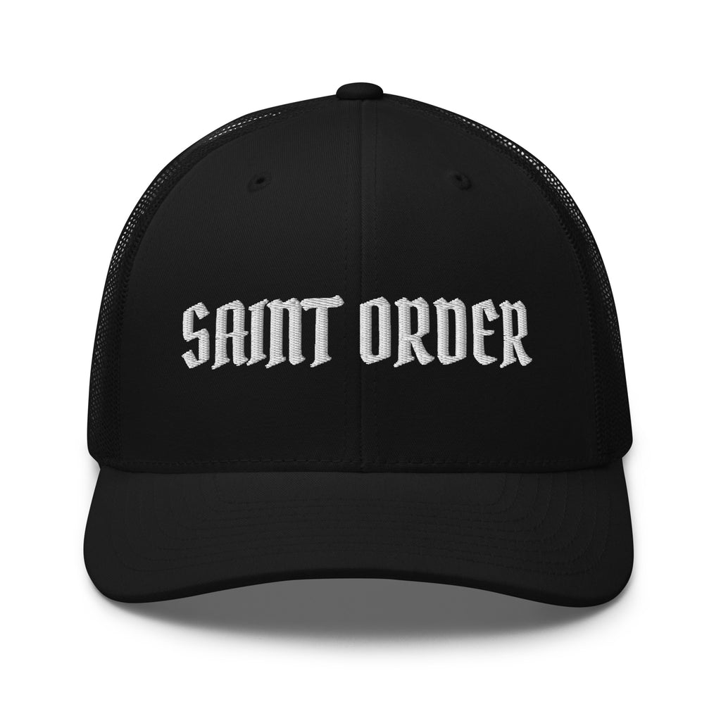 Front of the black Saint Order Signature Trucker cap, with a white embroidered Saint Order wordmark and curved visor.
